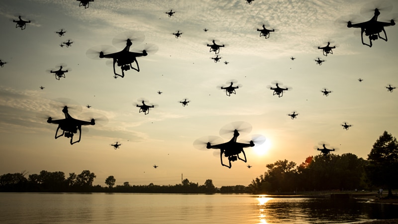 sunset sky filled with drones