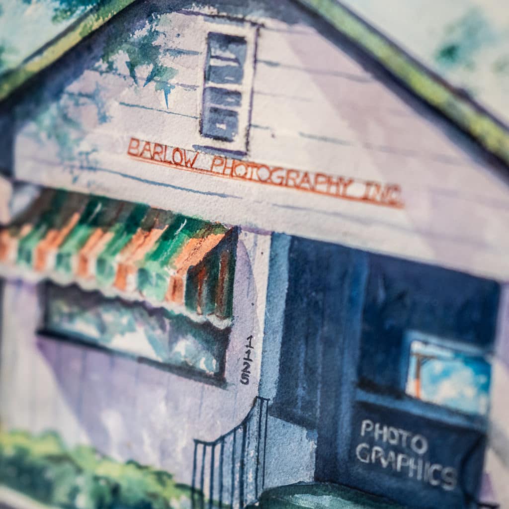 watercolor painting of a small business building