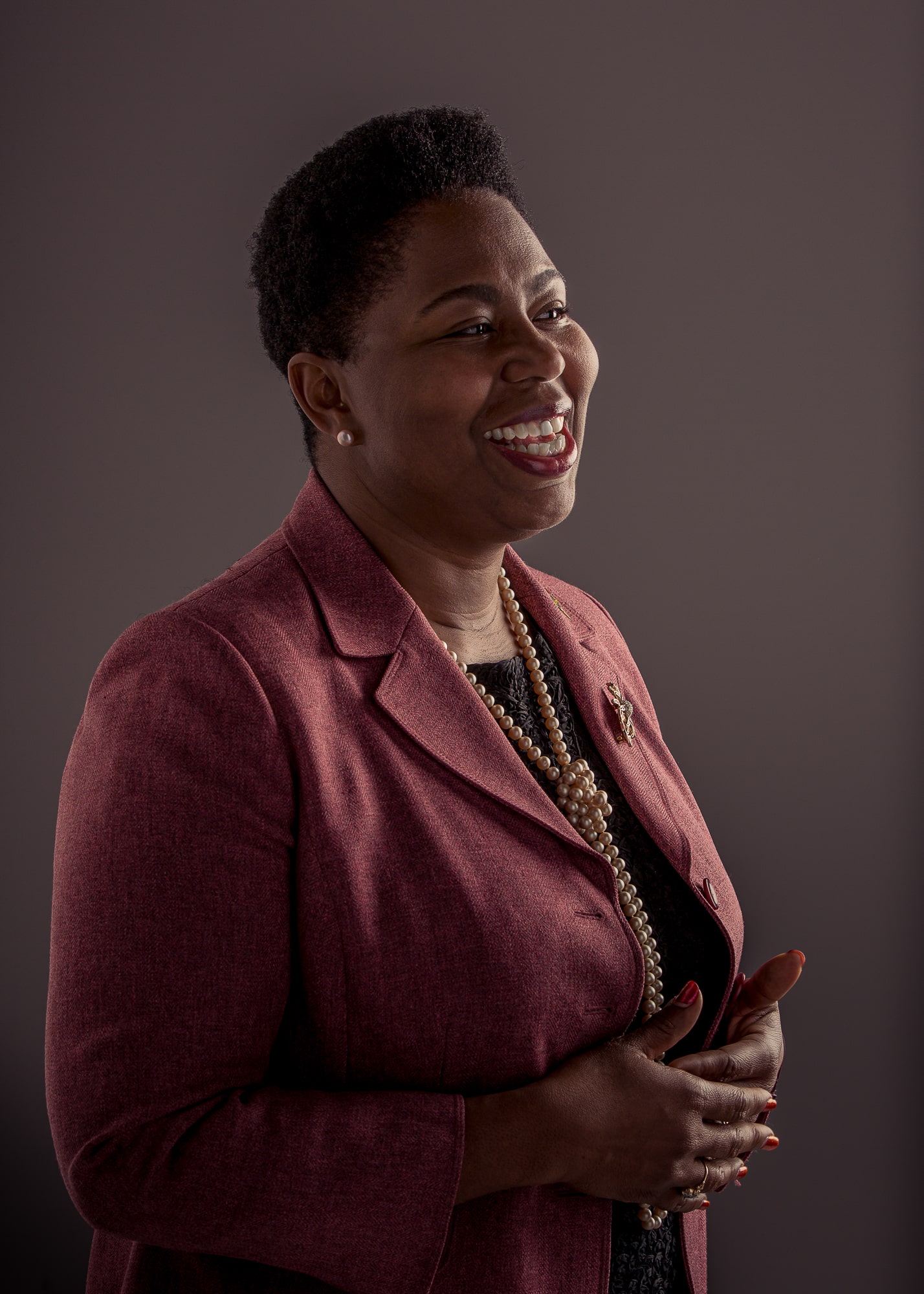 Nicole Adewale, woman in studio woman in studio smiling and talking