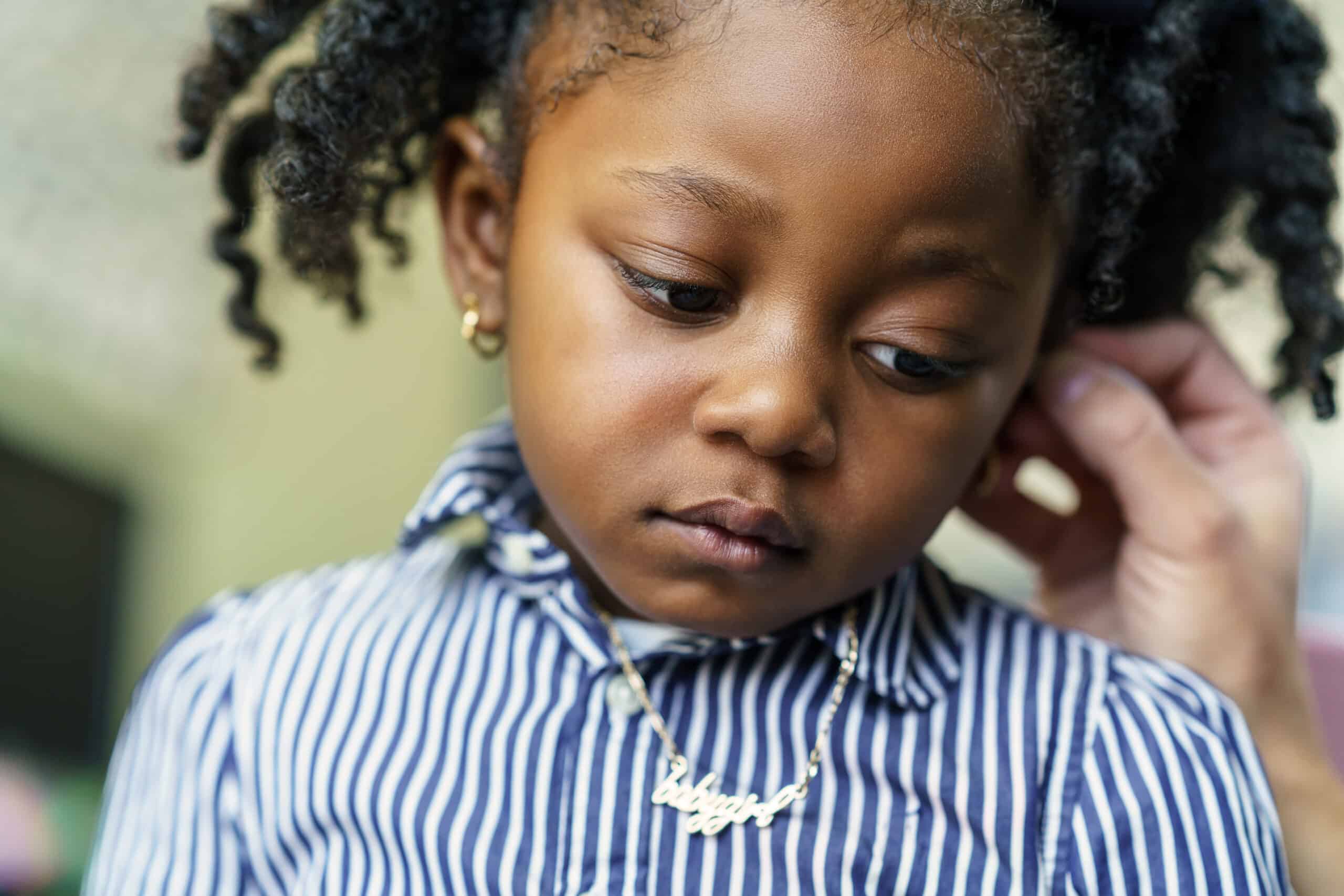 Nonprofit Photography St. Louis Little girl getting hearing tested