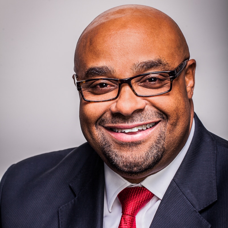 business portrait of man man in glasses and suit