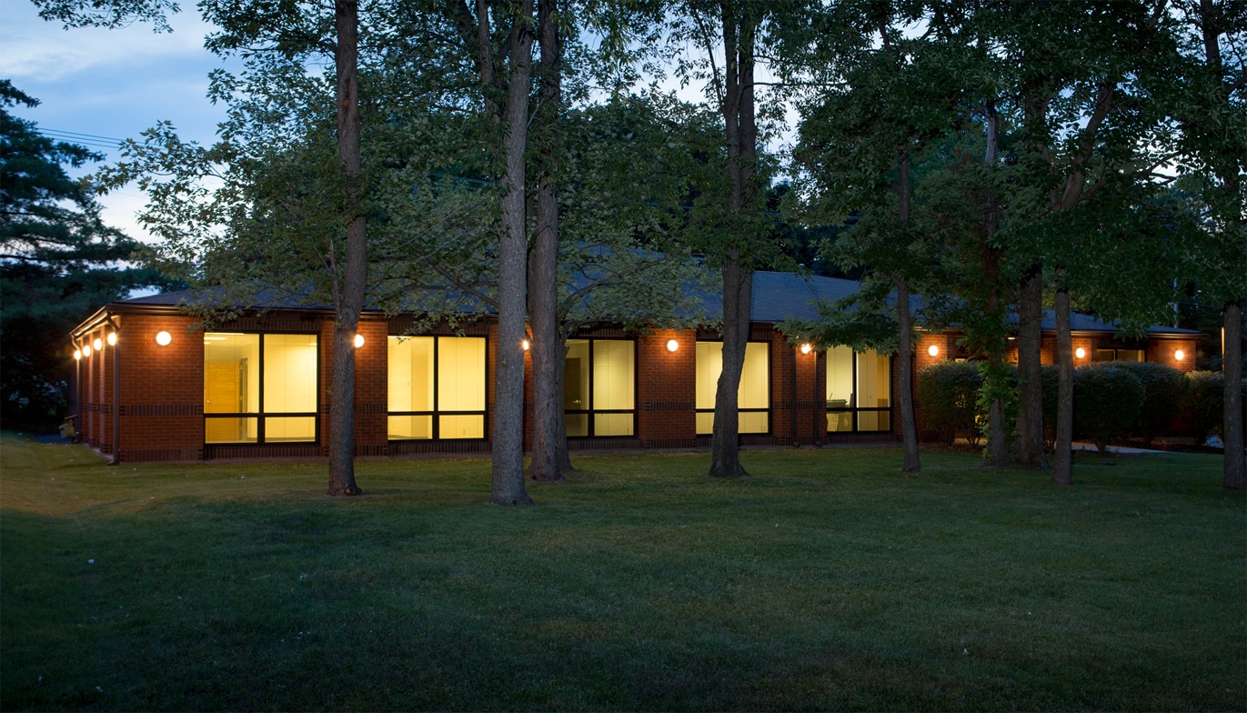1115 Olivette Executive Parkway building at dusk building exterior at dusk