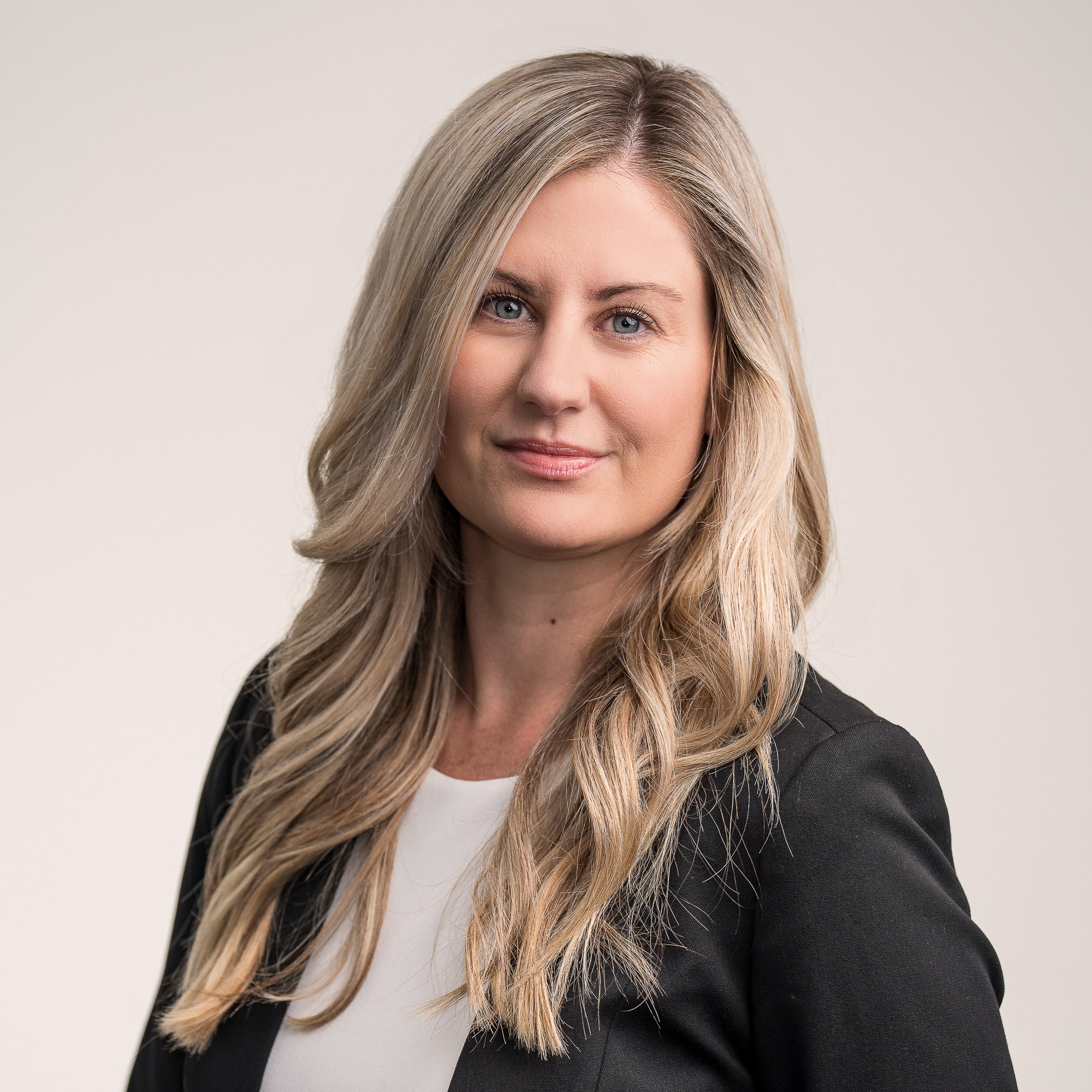 Kayla Finklang portrait, Peabody Smiling woman, business attire, headshot