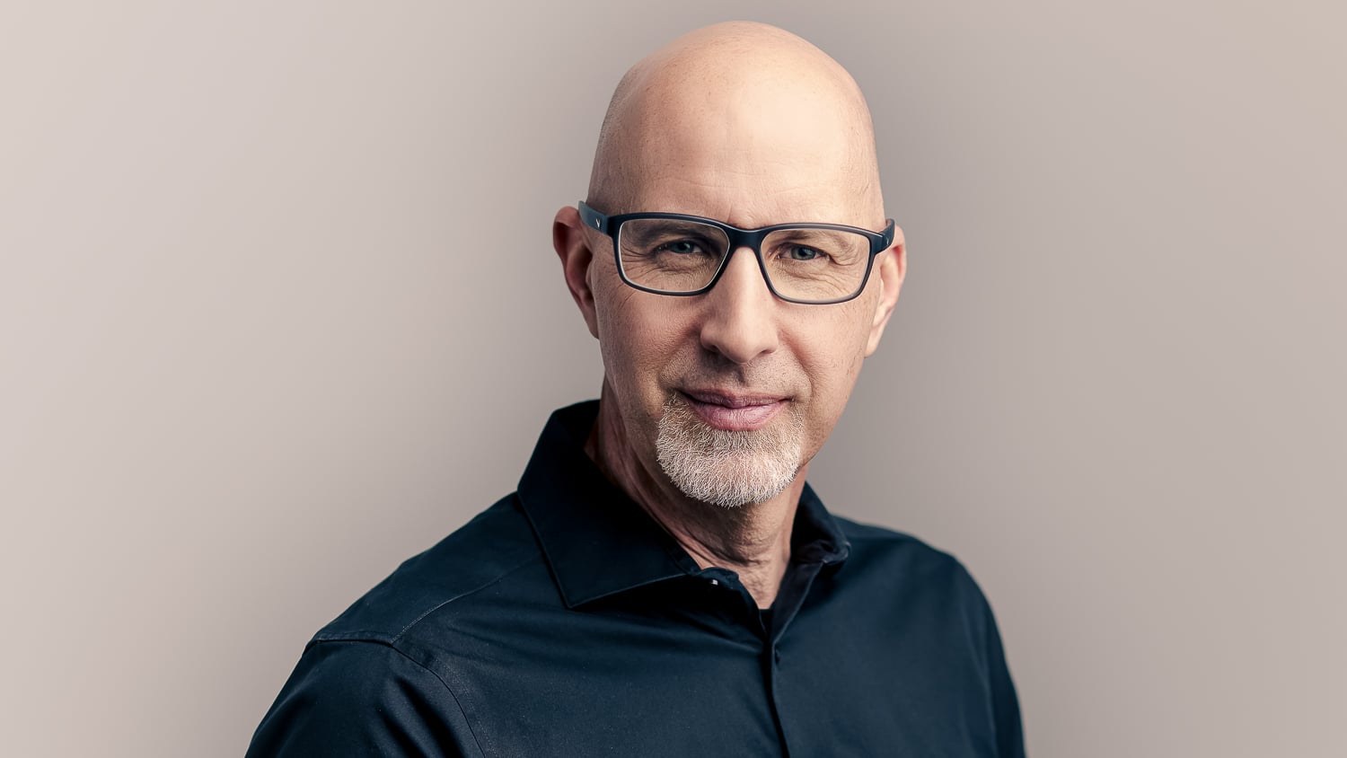 Commercial headshot of a businessperson in a studio in St. Louis.